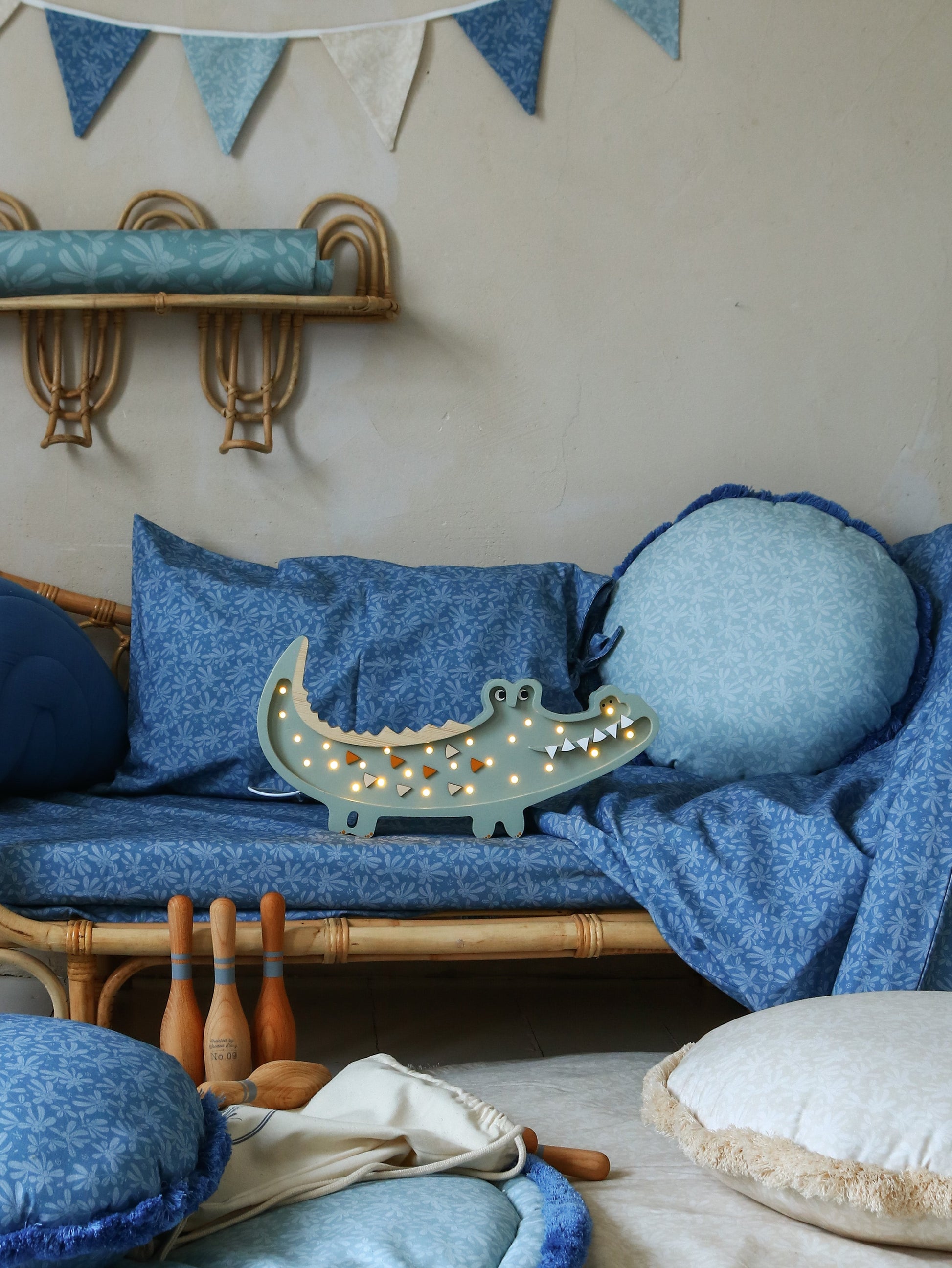 Pastel Khaki Crocodile Lamp illuminating cozy kids room décor