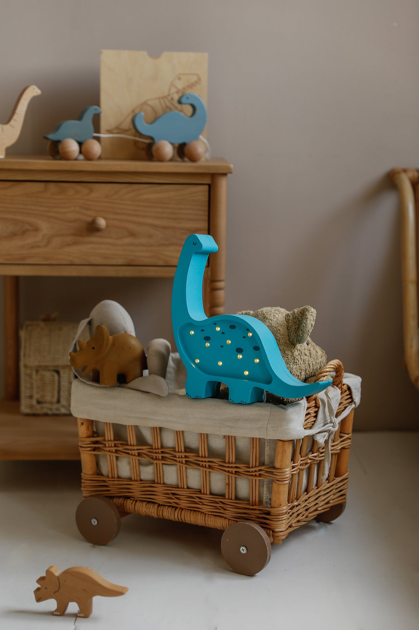 Dimmable wooden dino lamp in turquoise cyan for kids’ nursery